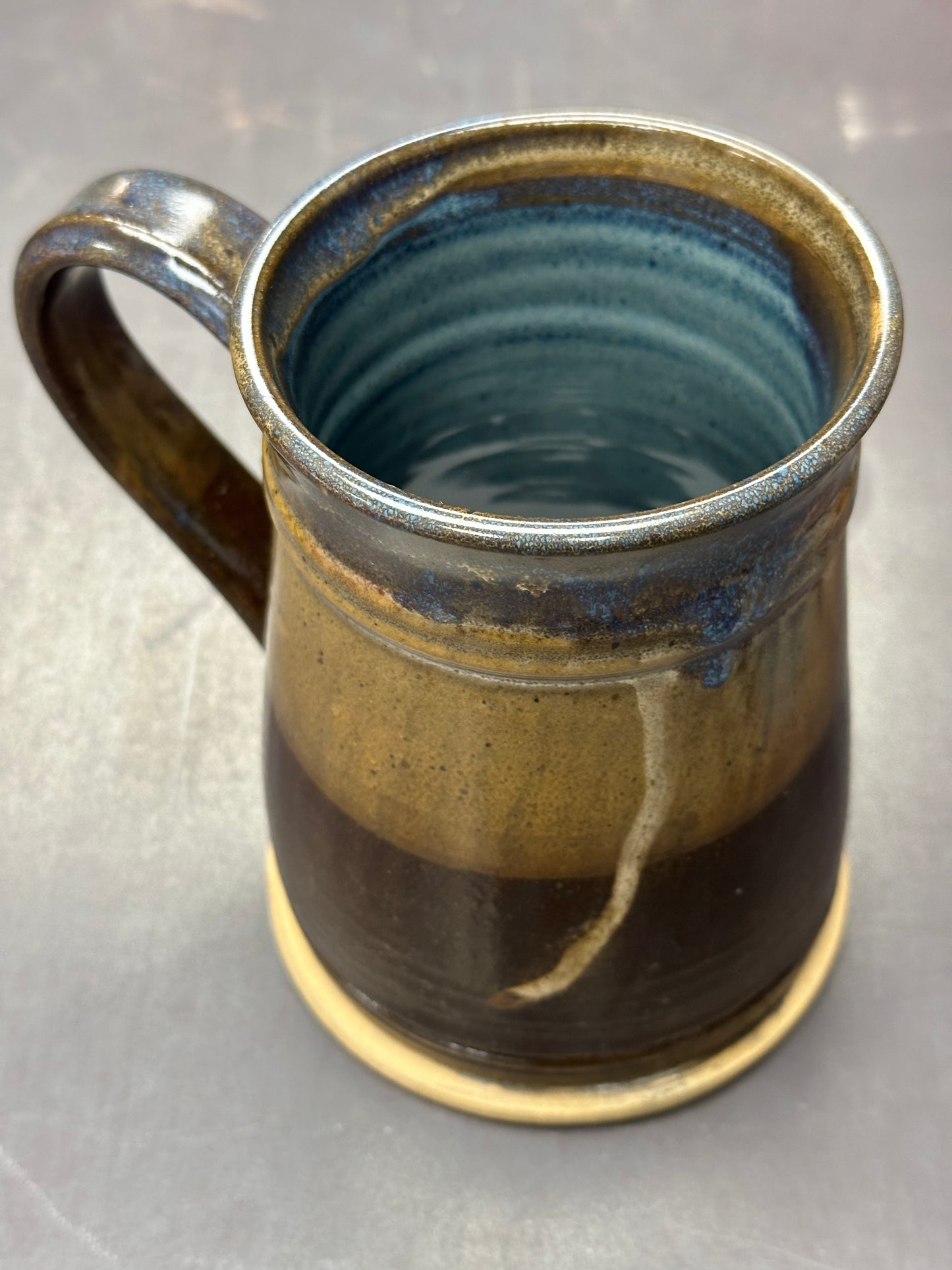 Brown and Gold with Blue Interior Pottery Tankard approximately 24 ounces (TS0106)